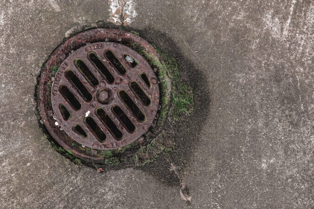how to clean drains outside
